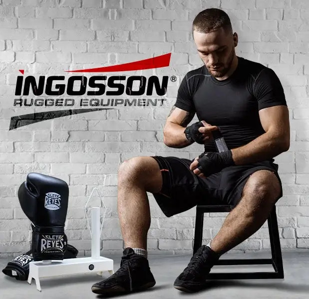 boxer wrapping his hans in front of the Ingosson brand logo